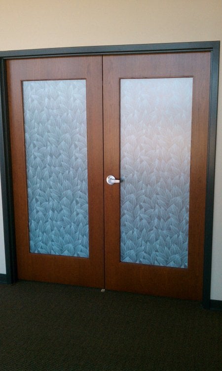French doors with frost leaf covered glass